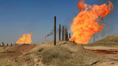 Flames emerge from flare stacks at the oilfields in Kirkuk, Iraq on October 18, 2017. Alaa Al Marjani / Reuters