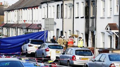 A woman has been arrested on suspicion of child neglect after two sets of twin boys, aged three and four, died in the house fire. PA
