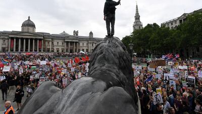 Demonstrators take part in a protest against Donald Trump in Trafalgar Square, London. Reuters