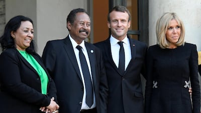 Economist Muna Abdalla with her husband Sudanese Prime Minister Abdalla Hamdok met French President Emmanuel Macron and his wife Brigitte Macron in September. AFP