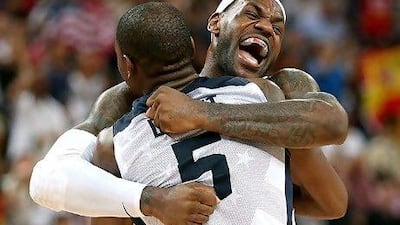 Kevin Durant, front, scored 30 points for the United States and LeBron James added 19 on the day to join Michael Jordan as the only players to win the NBA title, regular-season MVP, NBA Finals MVP and Olympic gold in the same year.