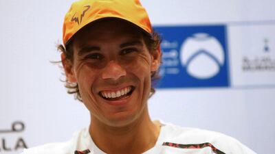 Rafael Nadal smiles during a press conference at Zayed Sports City in Abu Dhabi on Thursday ahead of the Mubadala World Tennis Championship. Marwan Naamani / AFP