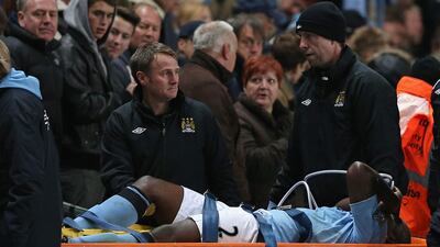 Micah Richards is stretchered off with an injury during the English Premier League match between Manchester City and Swansea City at the Etihad Stadium. Clive Brunskill/Getty Images