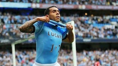 MANCHESTER, ENGLAND - AUGUST 19: Carlos Tevez of Manchester City celebrates scoring the opening goal during the Barclays Premier League match between Manchester City and Southampton at Etihad Stadium on August 19, 2012 in Manchester, England. (Photo by Michael Regan/Getty Images) *** Local Caption *** 150478316.jpg