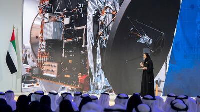 Sarah Yousif Al Amiri, UAE Minister of State for Advanced Sciences (on stage), delivers a speech during the UAE Government Annual Meeting at the St Regis Saadiyat. Mohamed Al Hammadi / Ministry of Presidential Affairs