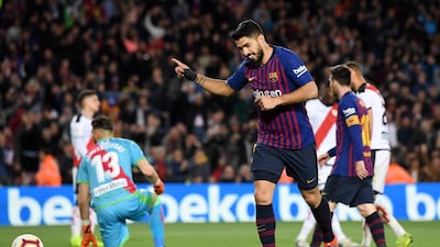 Barcelona's Luis Suarez celebrates after scoring his team's third goal. Getty Images