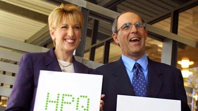 Carly Fiorina, the chairwoman of Hewlett-Packard, left, and Michael Capellas, the company's president, in the days after the HP-Compaq merger closed. The merger, which created the world's largest supplier of IT products to SMEs, is a case study in combining two radically different workplace cultures. Reuters