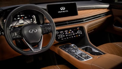 The horizontal dash fascia is replaced by a vertical console that houses a 12.3-inch infotainment touchscreen, a 12.3-inch display in front of the driver and a 10.8-inch heads-up display that reflects information off the windscreen