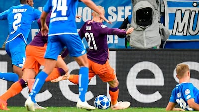 Silva, centre, scores the 1-2 goal. AFP