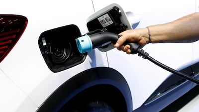 FILE PHOTO: The charging plug of a Renault Captur E-Tech Hybrid car is seen at Brussels Motor Show, Belgium January 9, 2020. REUTERS/Francois Lenoir/File Photo