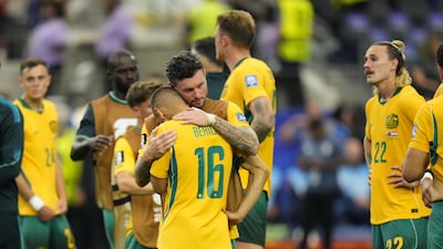 Dejected Australia players after the match. EPA