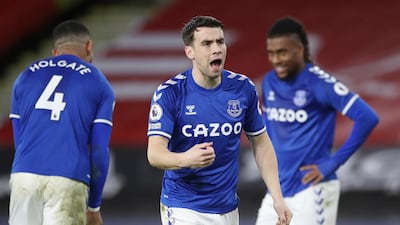 Everton's Seamus Coleman, centre, celebrates after the match. AP