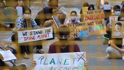 Activists take part in a protest against climate change in New Delhi, India. EPA