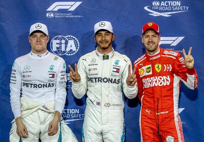 Sebastian Vettel, right, was beaten to the front row by Mercedes-GP pair Lewis Hamilton, centre, and Valtteri Bottas, left. EPA