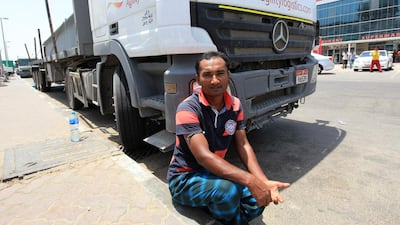 Mohammed Yousuf, 35, a Bangladeshi fire safety officer, says it dangerous to sleep under a lorry during the break hours. Ravindranath K / The National