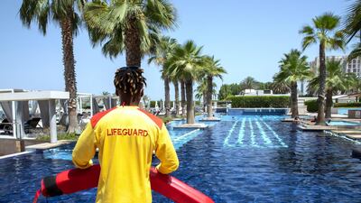 A lifeguard at the hotel pool.