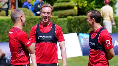 Actor Damian Lewis, centre, with Mark Noble and Joe Cole during a training session ahead of Soccer Aid at Champneys Tring, Wigginton. PA
