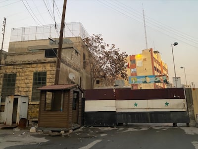 The political security branch in Aleppo, where guards showed ledgers with details of detainees and instruments of torture lay scattered inside. Lizzie Porter / The National