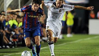 Lionel Messi, left, in action for Barcelona against the LA Galaxy during their recent tour to the United States.