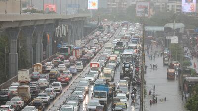 Congestion on a flooded street. The weather bureau issued a red alert after several parts of the city recorded over 200mm of rainfall in 24 hours, severely disrupting daily life. EPA