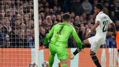 Real Madrid's Rodrygo scores his side's second goal past Chelsea goalkeeper Kepa Arrizabalaga in the Champions League quarter-final second leg at Stamford Bridge on Tuesday, April 18, 2023. AP
