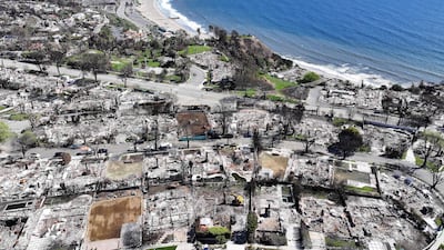 The Palisades Fire destroyed homes near the Pacific Ocean, highlighting how even the wealthy face rising climate risks. AFP