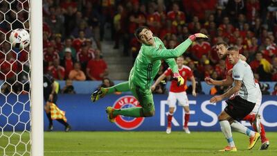 Wales forward Sam Vokes scores their third goal. Carl Recine / Reuters