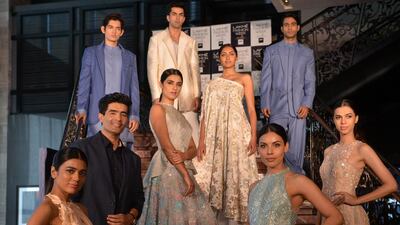 Designer Manish Malhotra (second from left) at this year’s Lakmé Fashion Week preview. Milind Shelte / India Today Group / Getty Images