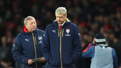 Arsene Wenger takes his Arsenal side to Tottenham aiming to avoid a defeat in the north London derby that could end their Premier League title hopes. Richard Heathcote / Getty Images