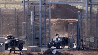 Israeli military vehicles entering Israel from Gaza. Reuters