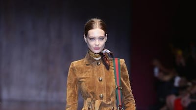 Seventies retro: The 1970s is a favourite decade with the Italians. They love the era’s colour palette of burnt orange, burgundy, forest green and brown. All of those shades cropped up at Gucci, where Frida Giannini also revived the red-and-green signature stripe on shoulder bags. Giannini’s vision is smarter and more buttoned up than the hippy looks seen elsewhere, with tailored tan suede coats and buttoned-up day dresses. This demure style was also played out at MaxMara with a willowy silhouette and blouses in a micro-floral print and also the high-necked dresses at Prada. Vittorio Zunino Celotto / Getty Images