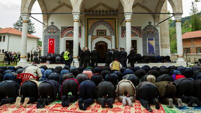 Believers pray after opening ceremony of the Aladza Mosque. Reuters