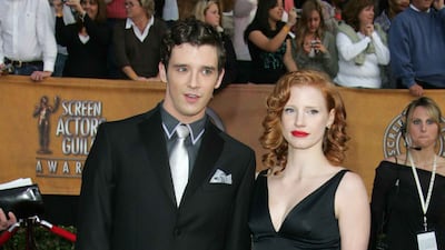 Michael Urie and Jessica Chastain, in a black cocktail dress, attend the Screen Actors Guild Awards on January 28, 2007. WireImage