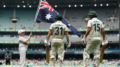 David Warner and Joe Burns of Australia walk out to bat in the second innings of the Melbourne Test against New Zealand. Getty Images