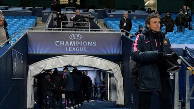 Barcelona manager Luis Enrique arrives to conduct his team's Monday training session for their Tuesday Champions League match against Manchester City. Peter Powell / EPA