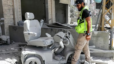 A mobility scooter is among the damaged items that litter the southern Lebanese village of Deir Qanoun Al Nahr after an Israeli attack. AFP