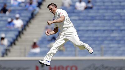 Australia's Steve O'Keefe celebrates after Virat Kohli's wicket during third day of the first cricket Test match against India in Pune, India, on February 25, 2017. Rajanish Kakade / AP