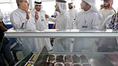 Dr Hashim Al Nuaimi, the the head of consumer protection at the Ministry of Economy, centre, inspects Sharjah's markets yesterday.