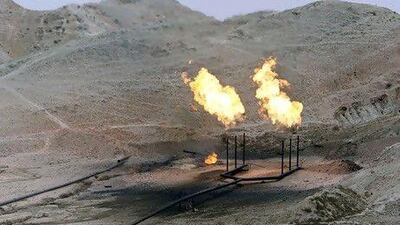Gas is flared off oil wells in Iran. AP Photo