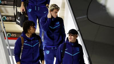 Soccer Football - FIFA World Cup Qatar 2022 Arrival - England team arrives in Doha - Hamad International Airport, Doha, Qatar - November 15, 2022 England's Aaron Ramsdale, Trent Alexander-Arnold and Conor Gallagher arrive in Doha ahead of the FIFA World Cup Qatar 2022 REUTERS / John Sibley
