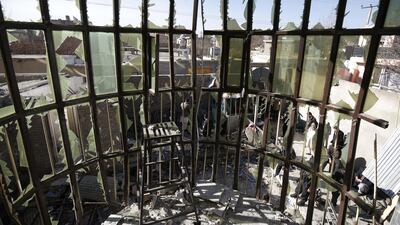 Afghan security officials inspect the scene of a suicide bomb attack in Kabul. Hedayatullah Amid/ EPA