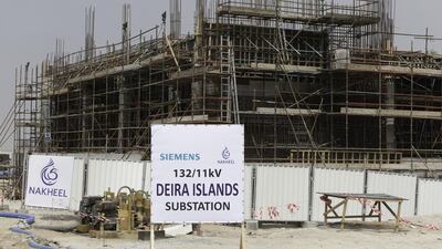 Above, construction of Nakheel's Deira Islands project in Dubai. Christopher Pike / The National