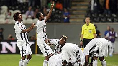 Mazember players celebrate after their shock win over Internacionale at Mohammed bin Zayed stadium in Abu Dhabi.