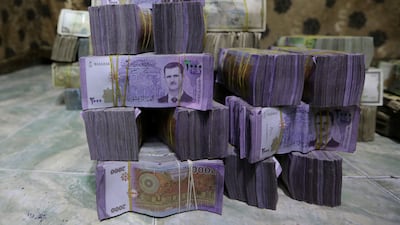 Former president Bashar Al Assad features on Syrian banknotes that will be replaced by Ahmad Al Shara's government, starting on January 1, 2026. Reuters