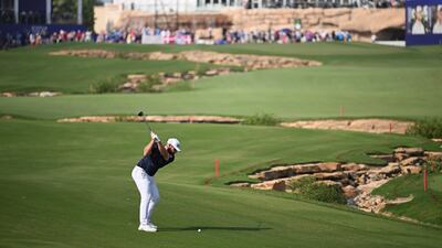 Tyrrell Hatton of England plays his second shot on the 18th hole. Getty Images