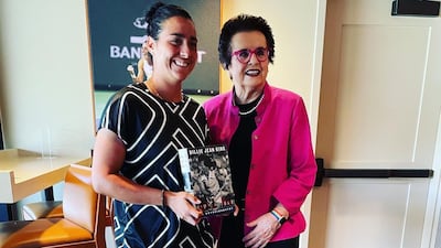 Ons Jabeur, left, with Billie Jean King after receiving a signed copy of the American's autobiography, 'All In'. Photo: @BillieJeanKing via Twitter