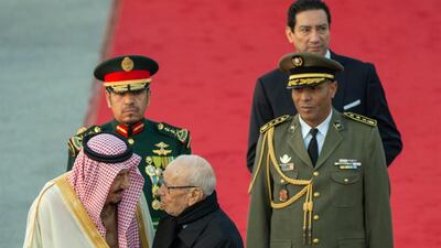 King Salman is welcomed by President Essebsi upon his arrival. EPA