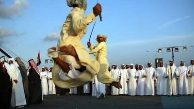 Traditional sword dancers perform for the crowds during the 2009 National Day celebrations on the Ras Al Khaimah Corniche. Nicole Hill / The National