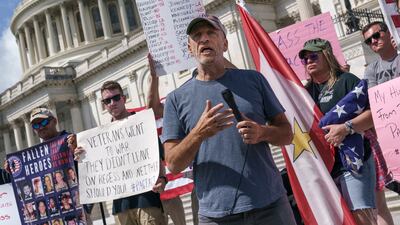 Comedian Jon Stewart protests with veterans, their family members and advocates against Senate Republicans blocking the 'burn pit' bill, on Capitol Hill in Washington. AP