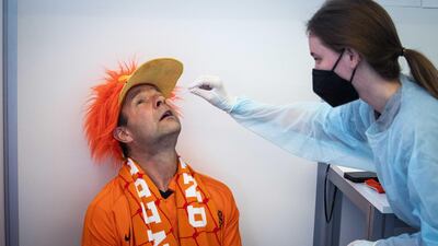 A Netherlands' fan gets tested before the UEFA EURO 2020 match between the Netherlands and Ukraine in Amsterdam, The Netherland. EPA